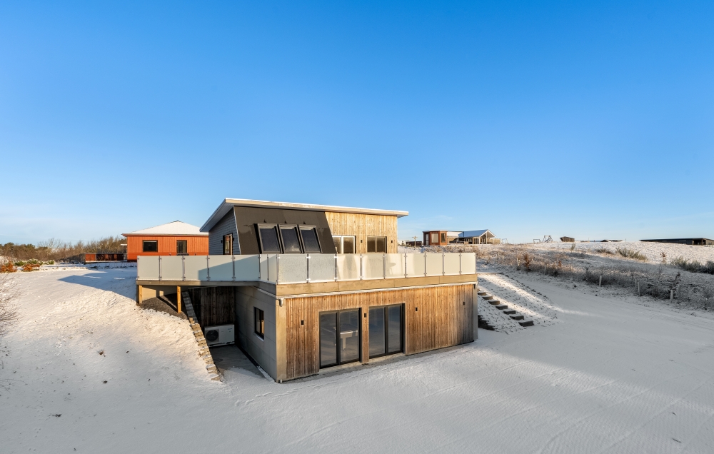Diese schicke Haus mit Whirlpool Nr. 603 mit Platz für 12 Personen liegt in Limfjord