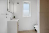 Eines der Badezimmer im Luxusferienhaus Nr. 320