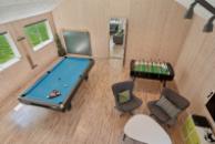 Aktivitätsraum im Luxusferienhaus Nr. 320 mit 7 Schlafzimmern und Platz für 18 Gäste.