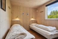 Eines der 7 Schlafzimmer im Luxusferienhaus Nr. 320