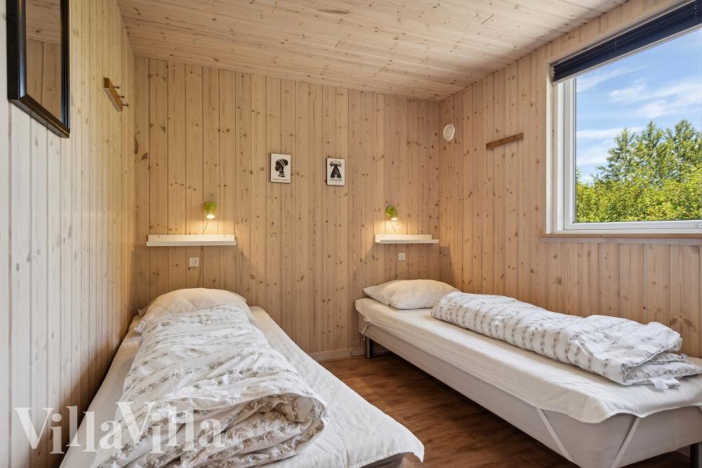 Eines der 7 Schlafzimmer im Luxusferienhaus Nr. 320