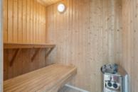 Genießen Sie die heiße Sauna im Luxusferienhaus Nr. 320 für 18 Personen