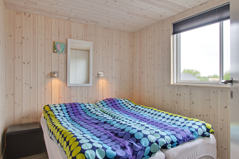 Eines der 7 Schlafzimmer im Luxusferienhaus Nr. 322