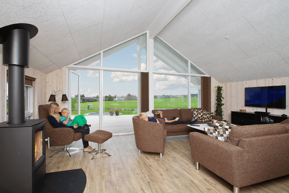 Die Couch im Luxusferienhaus Nr. 327 in Fünen und seine Inseln lädt zu Gesellschaftsspielen oder zu Kinoabenden ein.