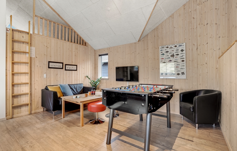 Aktivitätsraum im Luxusferienhaus Nr. 328 mit 7 Schlafzimmern und Platz für 18 Gäste.