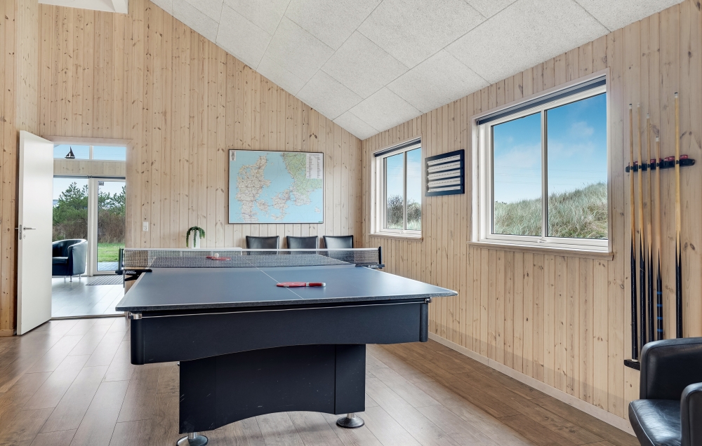 Das Luxusferienhaus 328 für 18 Personen hat einen großen Aktivitätsraum mit u. a. Billard und Darts