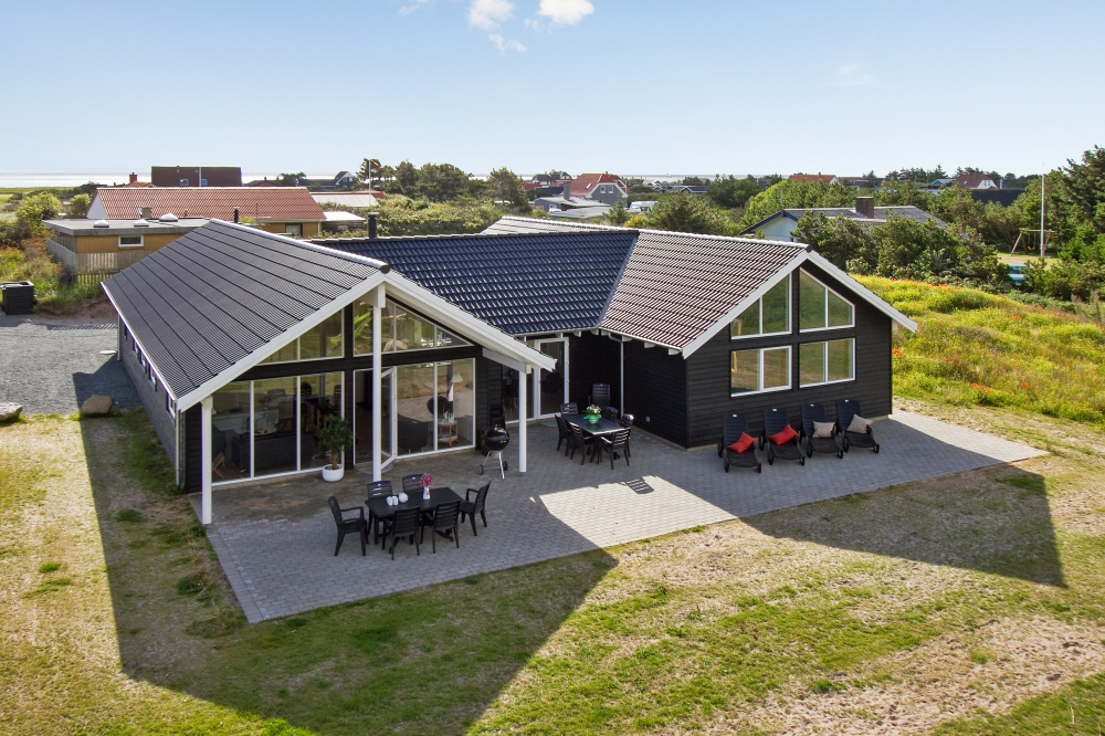 Dieses schöne Poolhaus Nr. 328 mit Platz für 18 Personen liegt in Westjütland