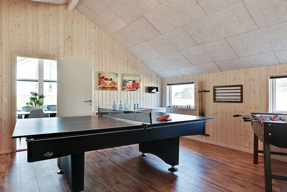 Das Luxusferienhaus 336 für 14 Personen hat einen großen Aktivitätsraum mit u. a. Billard und Darts