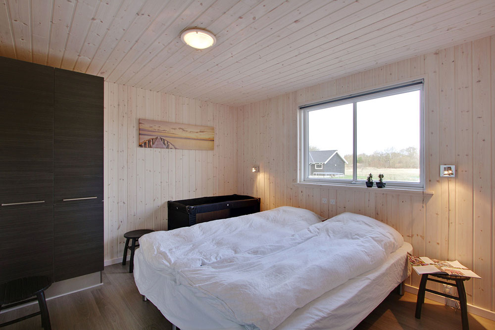 Eines der 9 Schlafzimmer im Luxusferienhaus Nr. 335