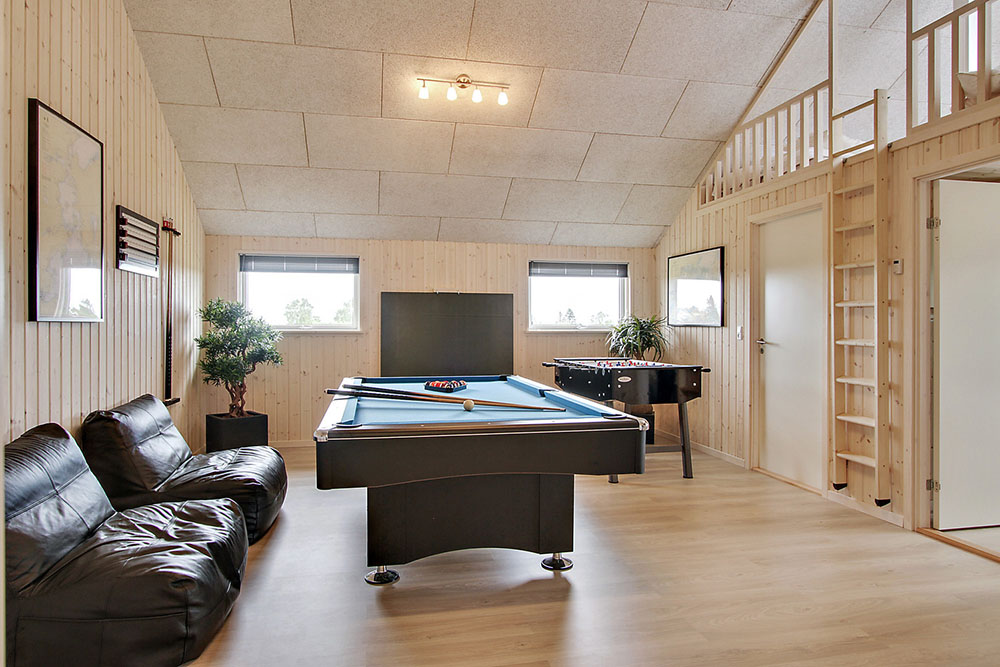 Aktivitätsraum im Luxusferienhaus Nr. 341 mit 5 Schlafzimmern und Platz für 14 Gäste.