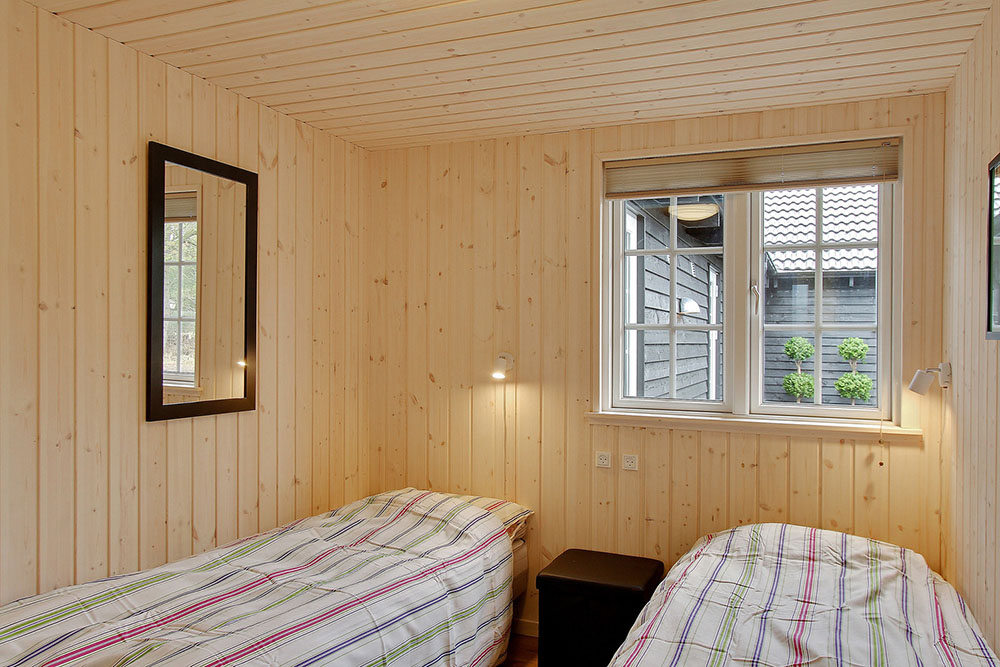 Eines der 9 Schlafzimmer im Luxusferienhaus Nr. 342