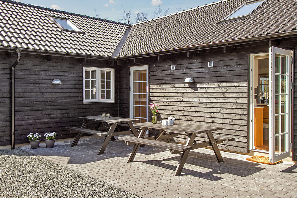 Das Luxusferienhaus Nr. 342 hat eine tolle Terrasse, die mit hochwertigen Gartenmöbeln für 24 Personen ausgestattet ist.