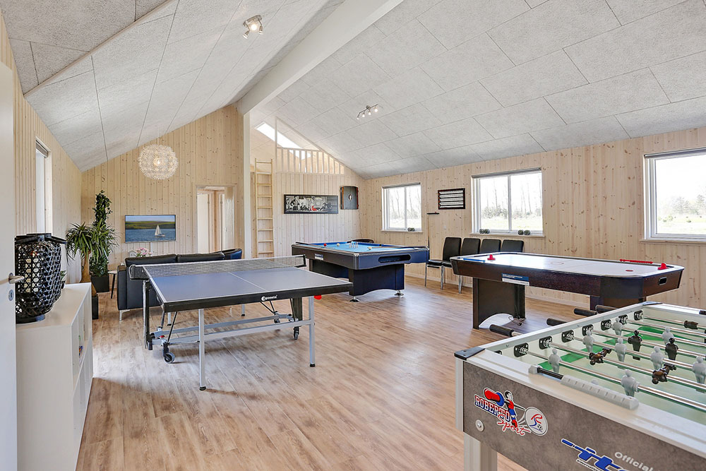 Neben den vielen schönen Stunden, die man im Poolbereich des Hauses verbringen kann, bietet das Luxusferienhaus 343 auch Spielevergnügen bei Billard/Tischtennis und Darts