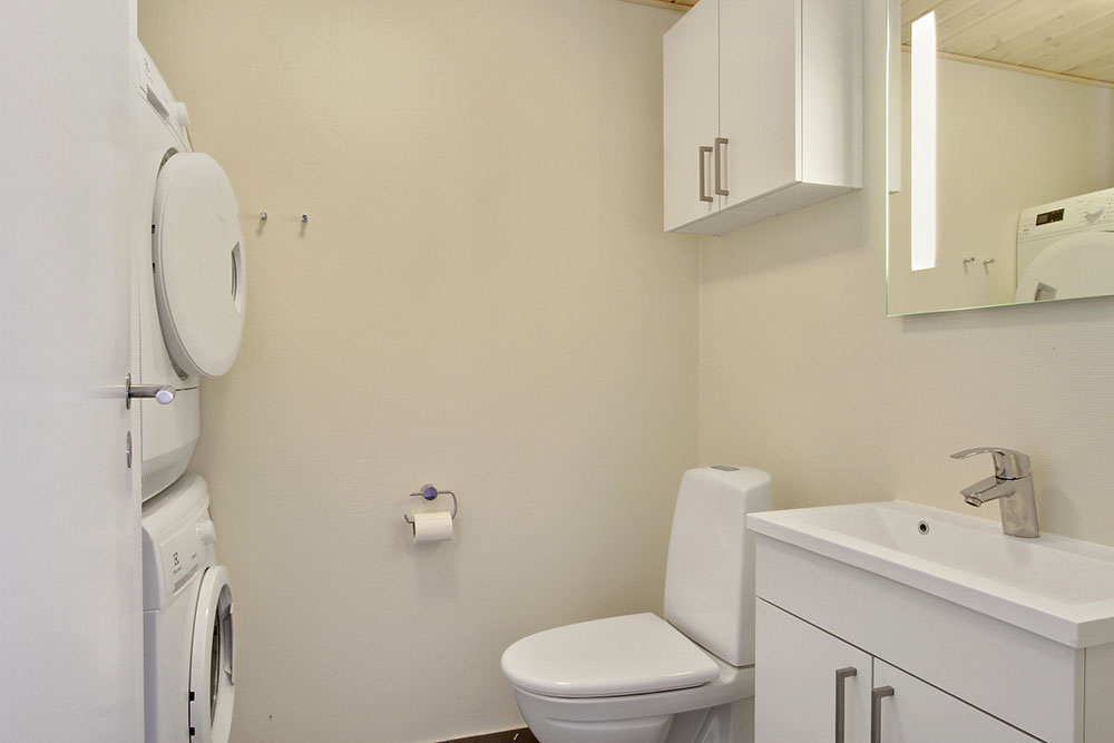 Eines der Badezimmer im Luxusferienhaus Nr. 351