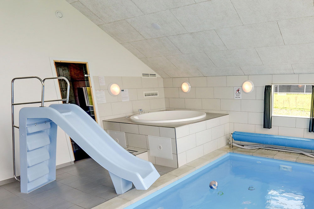 Genießen Sie den warmen Whirlpool im Luxusferienhaus Nr. 353 in Fünen und seine Inseln