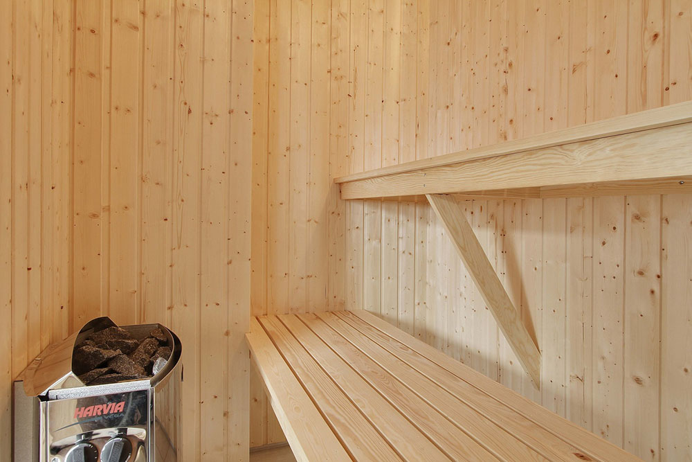 Genießen Sie die heiße Sauna im Luxusferienhaus Nr. 357 für 18 Personen