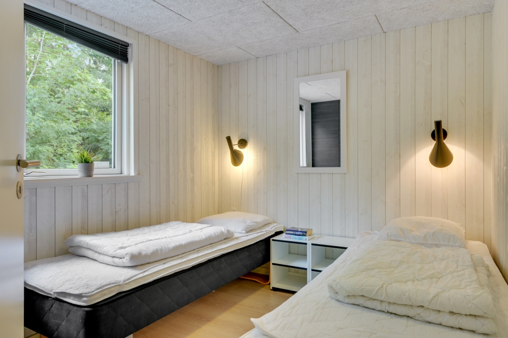 Eines der 8 Schlafzimmer im Luxusferienhaus Nr. 365