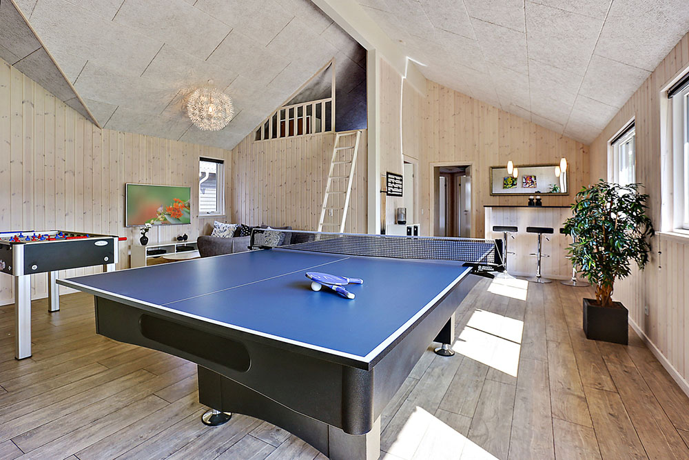 Neben den vielen schönen Stunden, die man im Poolbereich des Hauses verbringen kann, bietet das Luxusferienhaus 367 auch Spielevergnügen bei Billard/Tischtennis und Darts
