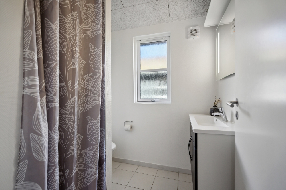 Eines der Badezimmer im Luxusferienhaus Nr. 371