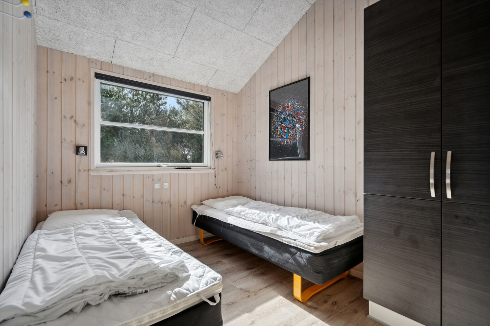 Eines der 9 Schlafzimmer im Luxusferienhaus Nr. 371