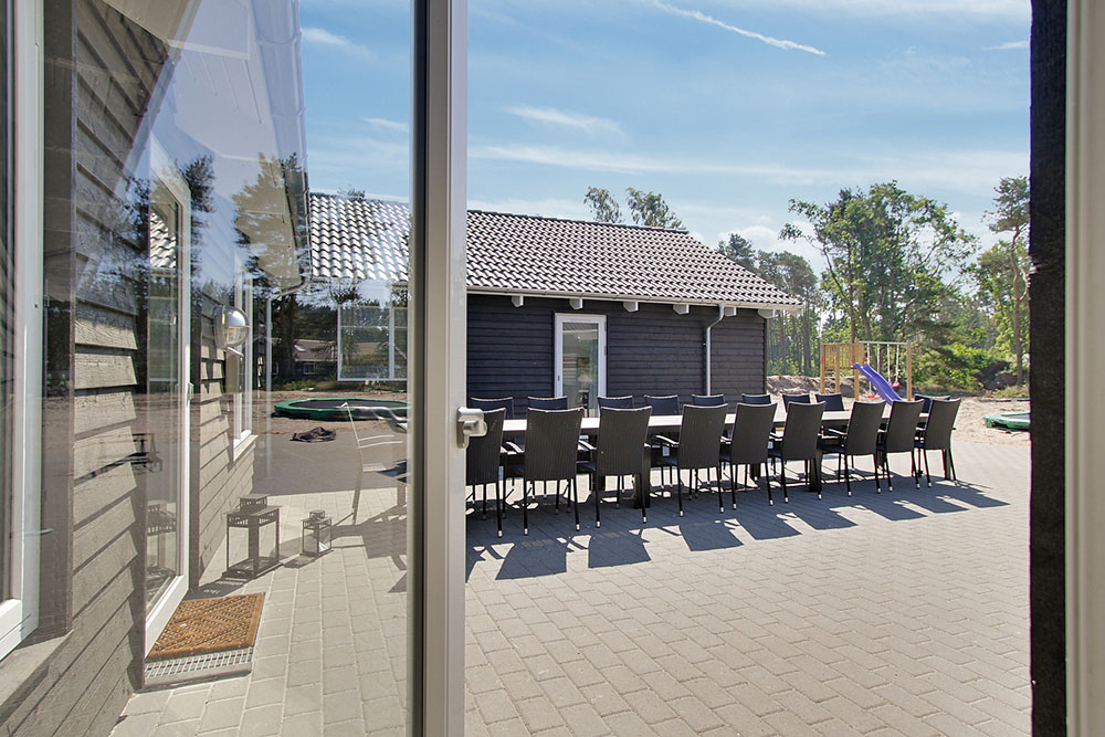 Genießen Sie einen Grillabend auf der Terrasse des Luxusferienhauses Nr. 374 in Bornholm