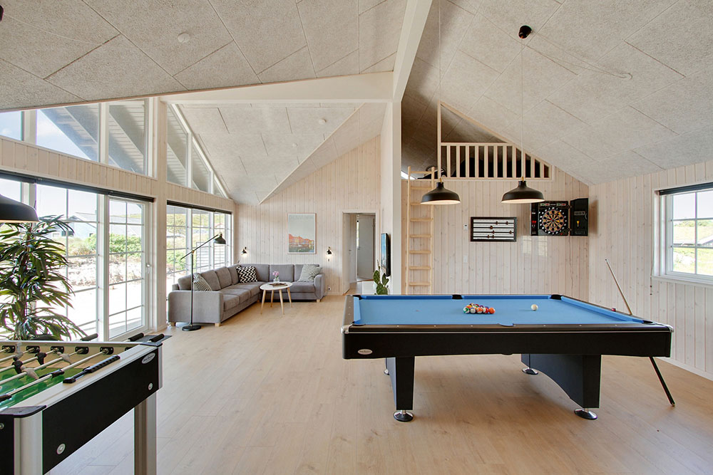 Neben den vielen schönen Stunden, die man im Poolbereich des Hauses verbringen kann, bietet das Luxusferienhaus 383 auch Spielevergnügen bei Billard/Tischtennis und Darts