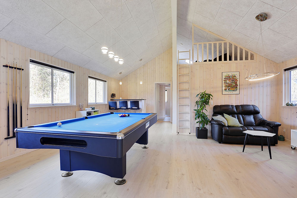Neben den vielen schönen Stunden, die man im Poolbereich des Hauses verbringen kann, bietet das Luxusferienhaus 384 auch Spielevergnügen bei Billard/Tischtennis und Darts