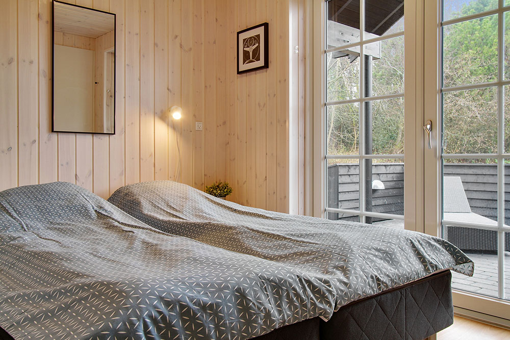Eines der 7 Schlafzimmer im Luxusferienhaus Nr. 386