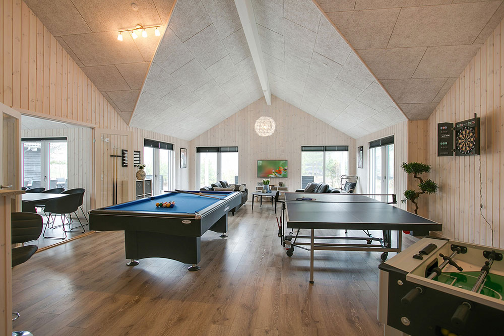 Neben den vielen schönen Stunden, die man im Poolbereich des Hauses verbringen kann, bietet das Luxusferienhaus 387 auch Spielevergnügen bei Billard/Tischtennis und Darts