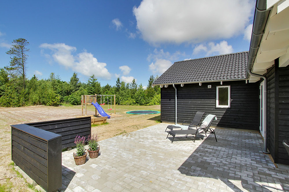 Auf der Terrasse des Ferienhauses Nr. 387 ist Platz für 24 Personen.