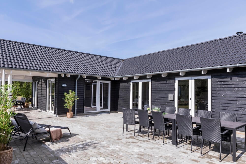 Genießen Sie einen Grillabend auf der Terrasse des Luxusferienhauses Nr. 387 in Westjütland