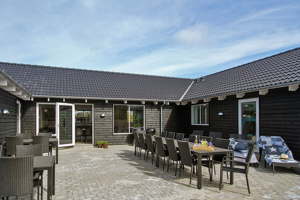 Das Luxusferienhaus Nr. 394 hat eine tolle Terrasse, die mit hochwertigen Gartenmöbeln für 20 Personen ausgestattet ist.