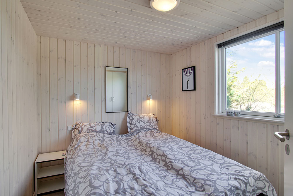 Eines der 8 Schlafzimmer im Luxusferienhaus Nr. 394