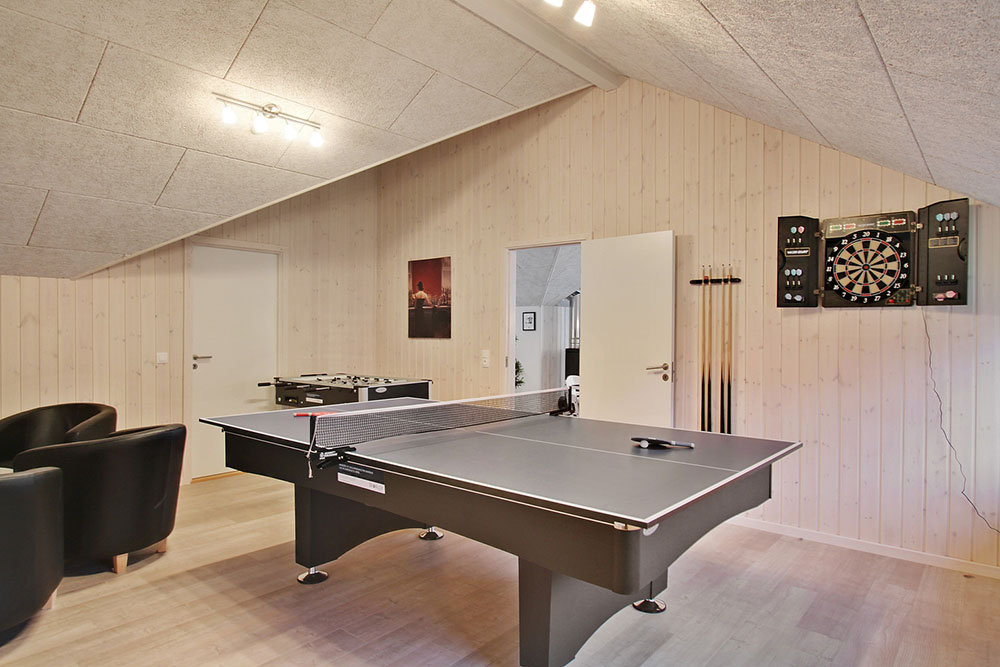Aktivitätsraum im Luxusferienhaus Nr. 702 mit 5 Schlafzimmern und Platz für 12 Gäste.