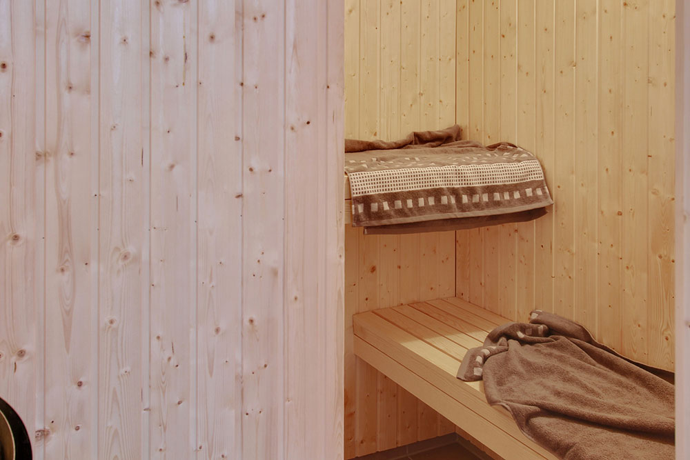 Genießen Sie die heiße Sauna im Luxusferienhaus Nr. 702 für 12 Personen