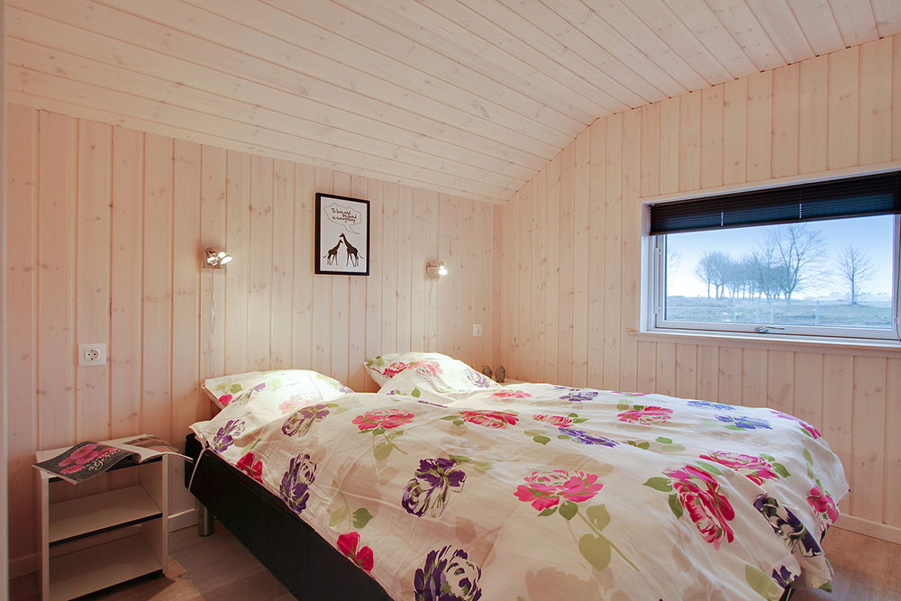 Eines der 5 Schlafzimmer im Luxusferienhaus Nr. 702