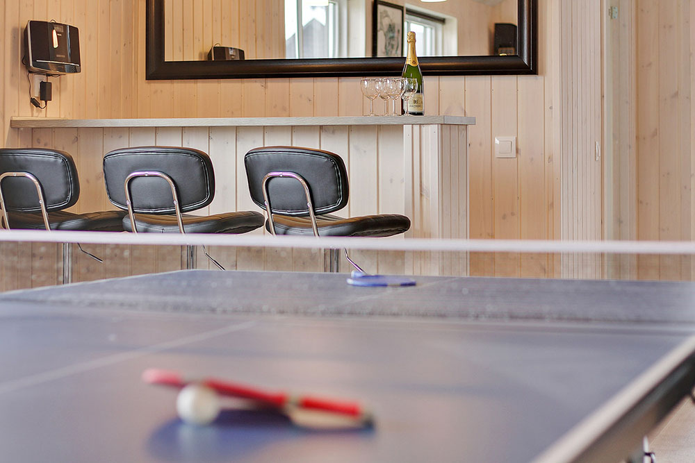 Das Luxusferienhaus 703 für 20 Personen hat einen großen Aktivitätsraum mit u. a. Billard und Darts