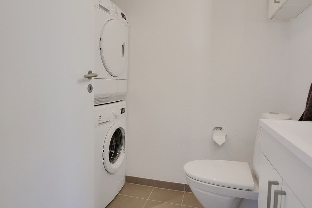 Eines der Badezimmer im Luxusferienhaus Nr. 703