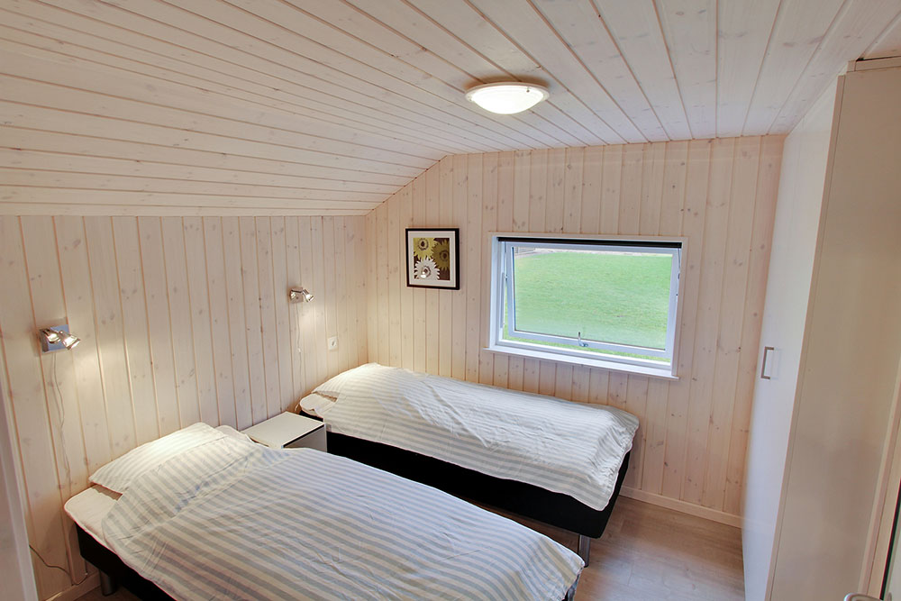 Eines der 5 Schlafzimmer im Luxusferienhaus Nr. 708