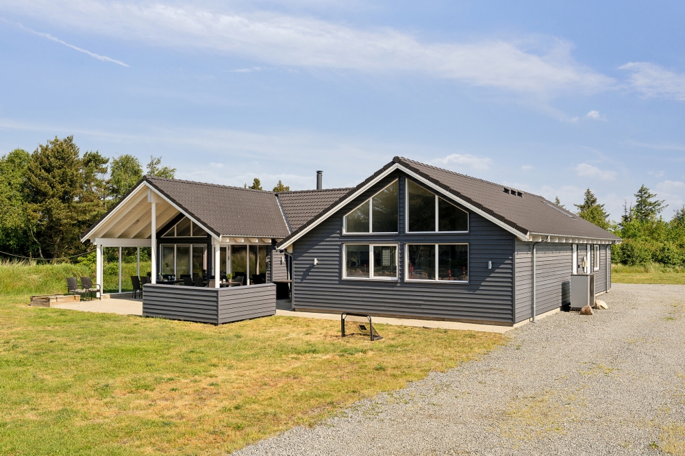 Dieses schöne Poolhaus Nr. 396 mit Platz für 16 Personen liegt in Westjütland