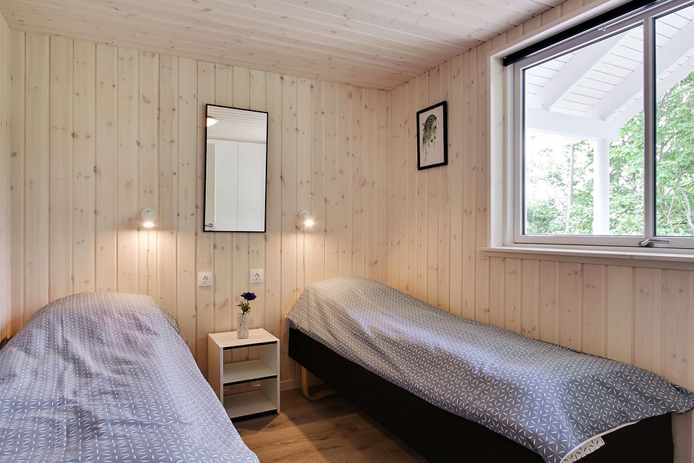 Eines der 9 Schlafzimmer im Luxusferienhaus Nr. 714