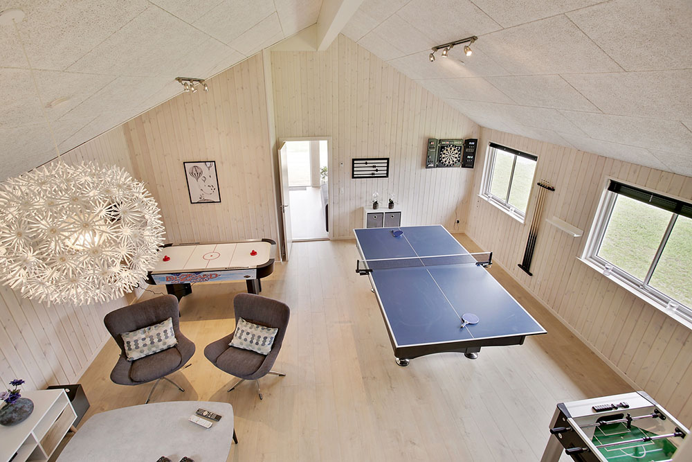 Aktivitätsraum im Luxusferienhaus Nr. 388 mit 6 Schlafzimmern und Platz für 16 Gäste.