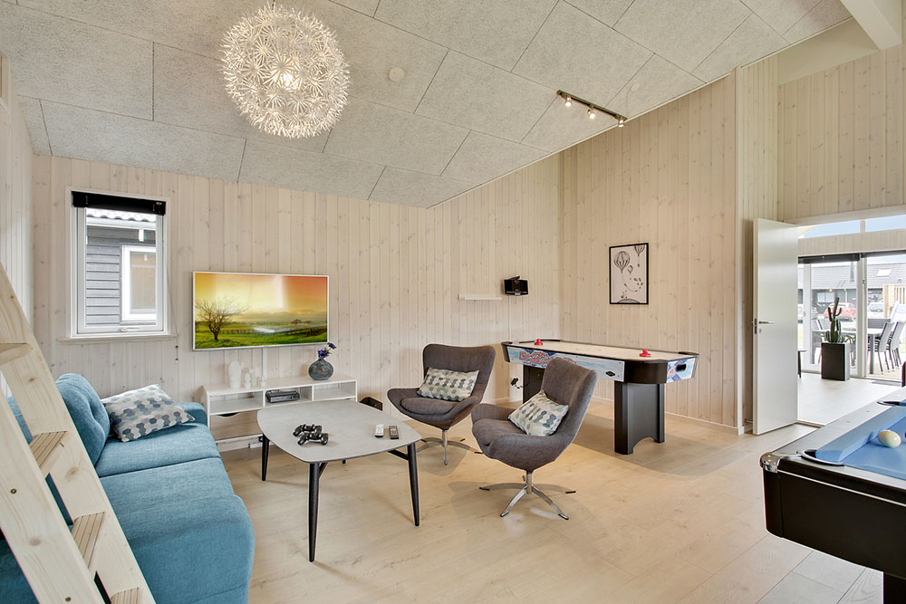 Das Luxusferienhaus 388 für 16 Personen hat einen großen Aktivitätsraum mit u. a. Billard und Darts
