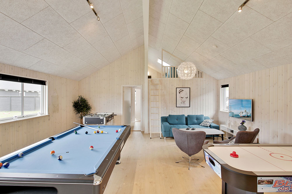 Neben den vielen schönen Stunden, die man im Poolbereich des Hauses verbringen kann, bietet das Luxusferienhaus 388 auch Spielevergnügen bei Billard/Tischtennis und Darts