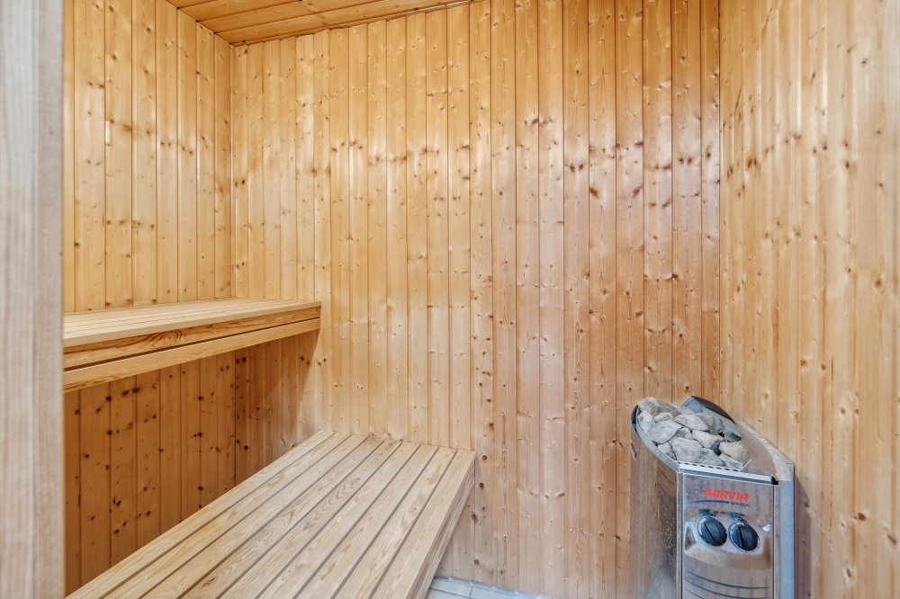 Genießen Sie die heiße Sauna im Luxusferienhaus Nr. 397 für 18 Personen