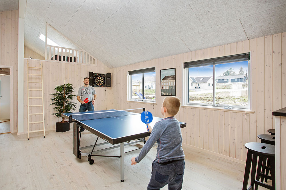 Das Luxusferienhaus 398 für 22 Personen hat einen großen Aktivitätsraum mit u. a. Billard und Darts
