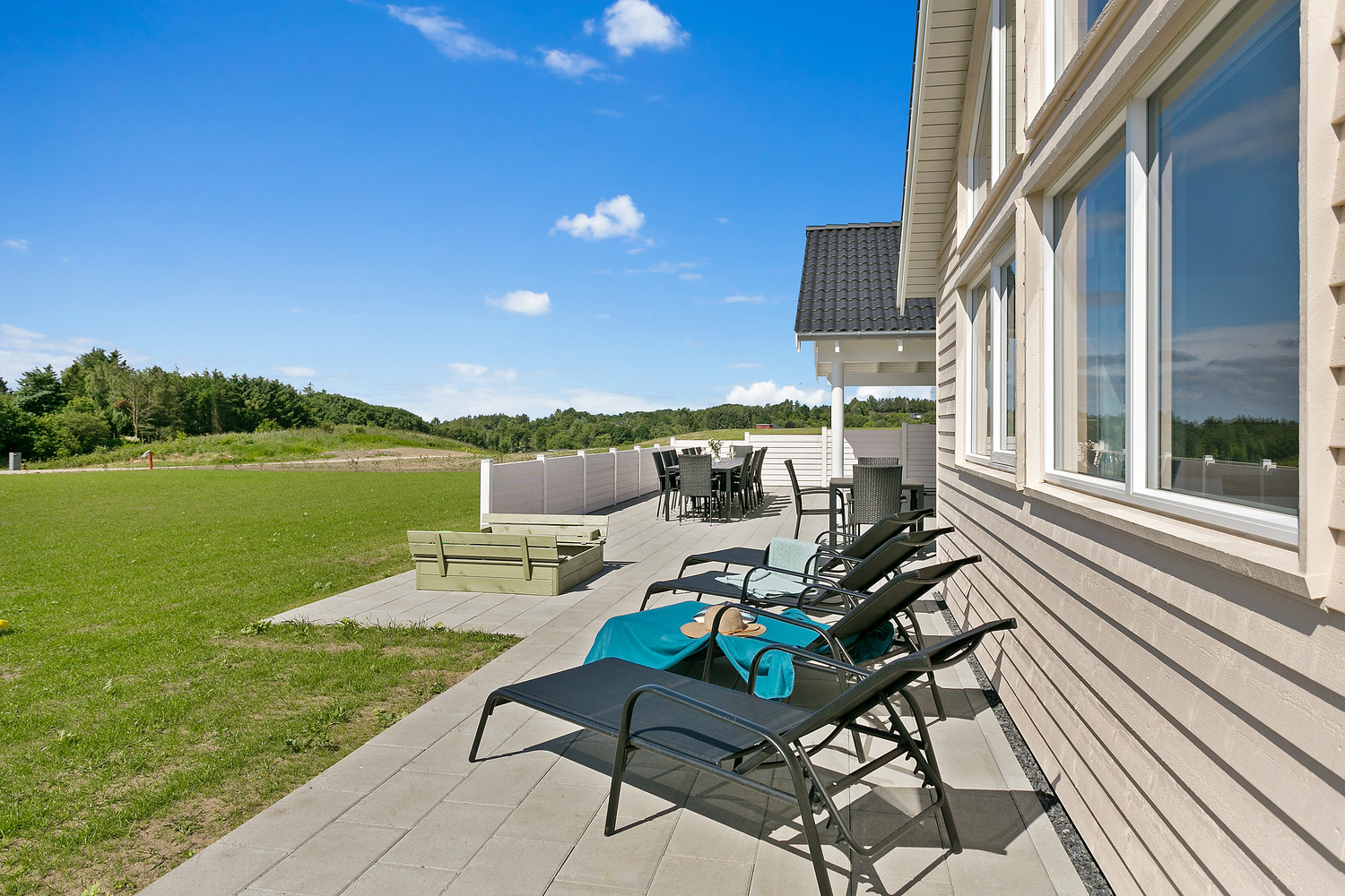 Das Luxusferienhaus Nr. 405 hat eine tolle Terrasse, die mit hochwertigen Gartenmöbeln für 18 Personen ausgestattet ist.