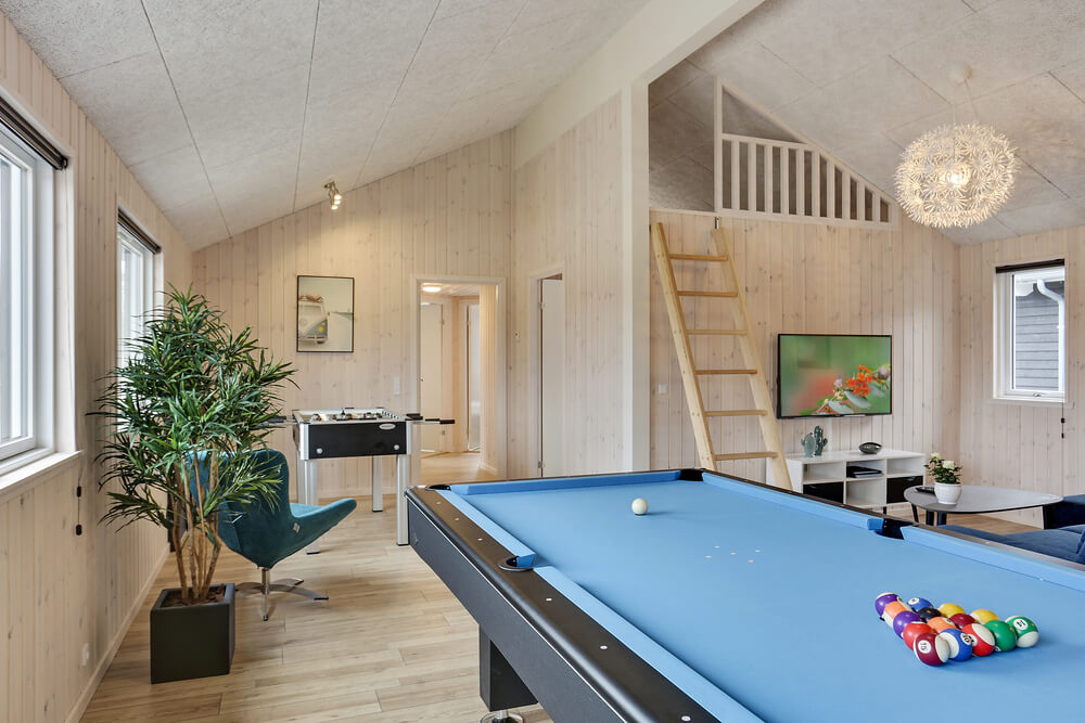 Neben den vielen schönen Stunden, die man im Poolbereich des Hauses verbringen kann, bietet das Luxusferienhaus 408 auch Spielevergnügen bei Billard/Tischtennis und Darts
