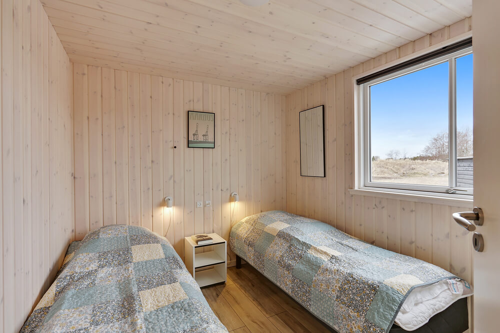 Eines der 7 Schlafzimmer im Luxusferienhaus Nr. 408