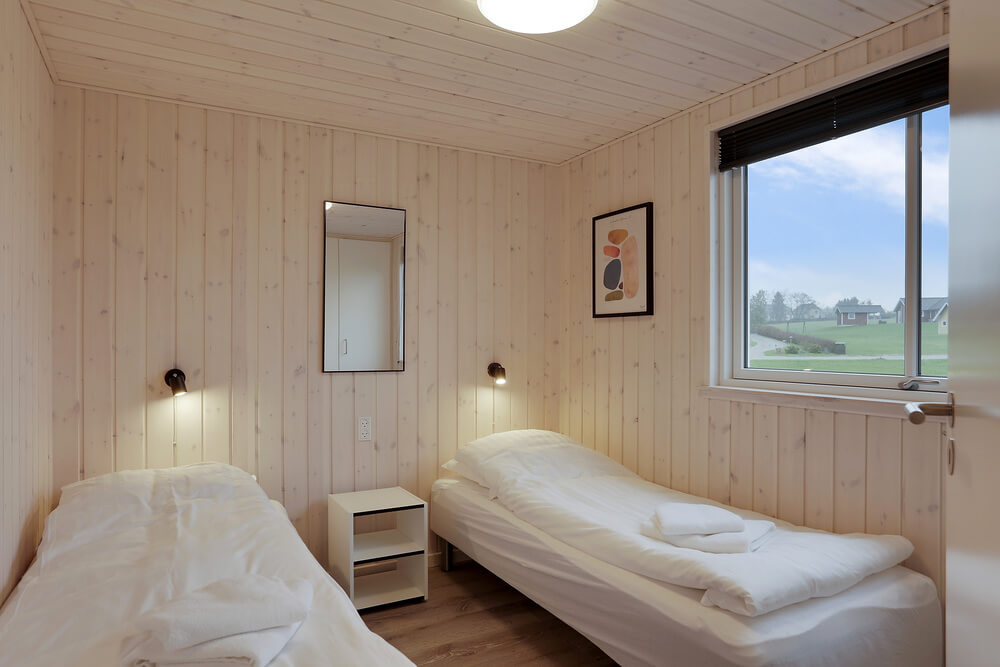 Eines der 7 Schlafzimmer im Luxusferienhaus Nr. 392